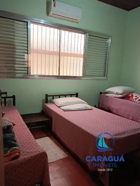 Foto 8 de Casa com 3 quartos à venda, 102m2 em Centro, Caraguatatuba - SP