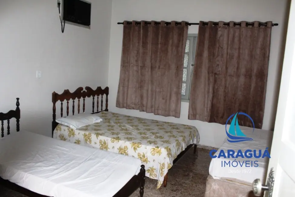 Foto 8 de Casa com 4 quartos à venda, 149m2 em Jardim Primavera, Caraguatatuba - SP