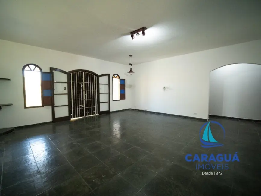 Casa com 4 quartos para alugar, 160m2 em Indaiá, Caraguatatuba - SP - imagem 5 Foto 5 de Casa com 4 quartos para alugar, 160m2 em Indaiá, Caraguatatuba - SP