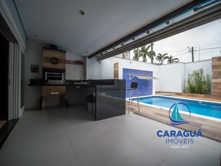 Foto 9 de Casa com 4 quartos à venda, 325m2 em Sumaré, Caraguatatuba - SP