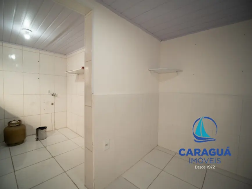 Foto 2 de Kitnet com 1 quarto para alugar, 30m2 em Sumaré, Caraguatatuba - SP