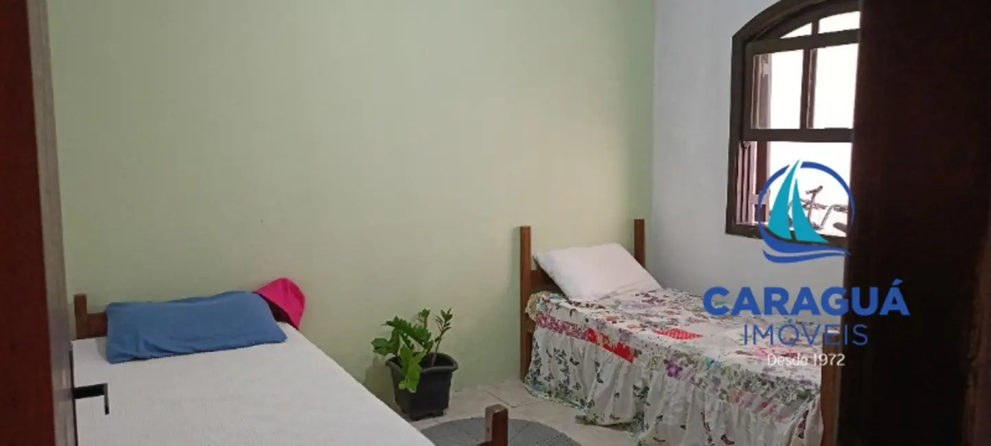 Foto 8 de Casa com 4 quartos à venda, 231m2 em Cidade Jardim, Caraguatatuba - SP