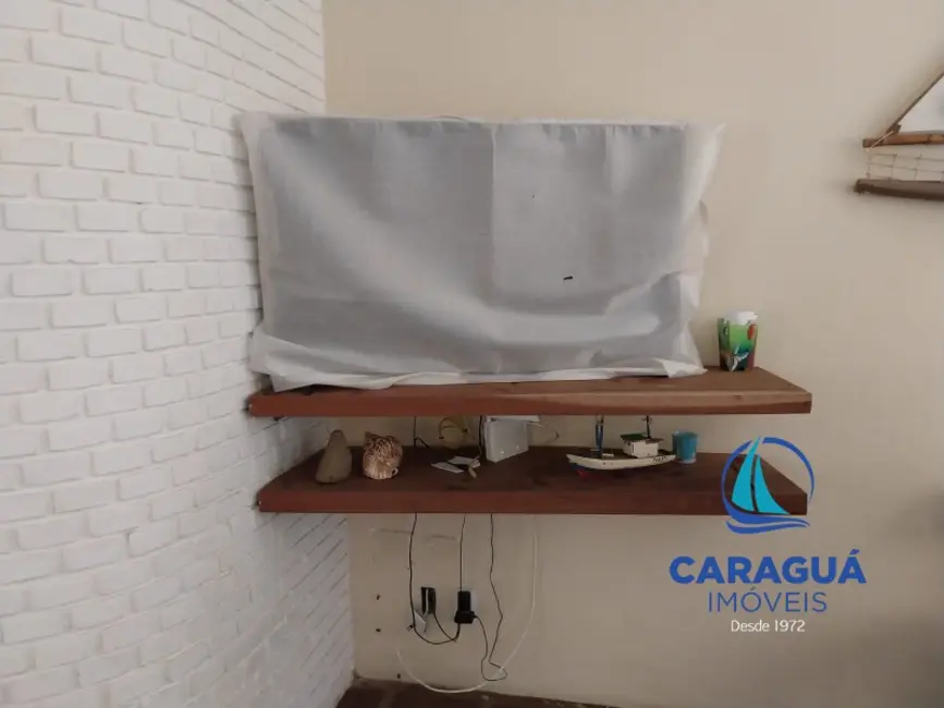 Foto 3 de Casa com 3 quartos para alugar, 160m2 em Loteamento Jardim Aruan, Caraguatatuba - SP