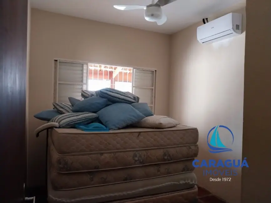 Foto 4 de Casa com 3 quartos para alugar, 160m2 em Loteamento Jardim Aruan, Caraguatatuba - SP