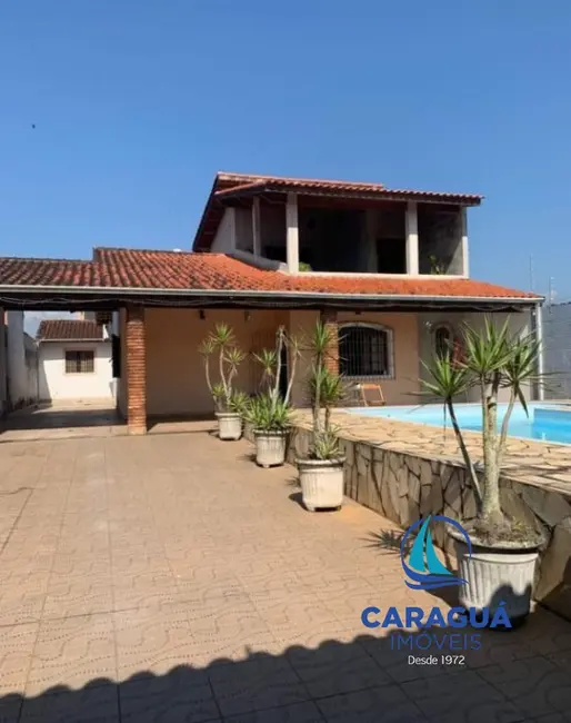 Casa com 3 quartos à venda, 170m2 em Pontal de Santa Marina, Caraguatatuba - SP - imagem 5 Foto 5 de Casa com 3 quartos à venda, 170m2 em Pontal de Santa Marina, Caraguatatuba - SP