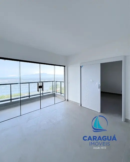 Foto 3 de Apartamento com 1 quarto à venda, 46m2 em Indaiá, Caraguatatuba - SP