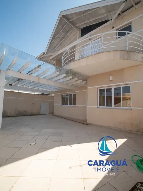 Foto 2 de Casa com 3 quartos à venda, 222m2 em Cidade Jardim, Caraguatatuba - SP