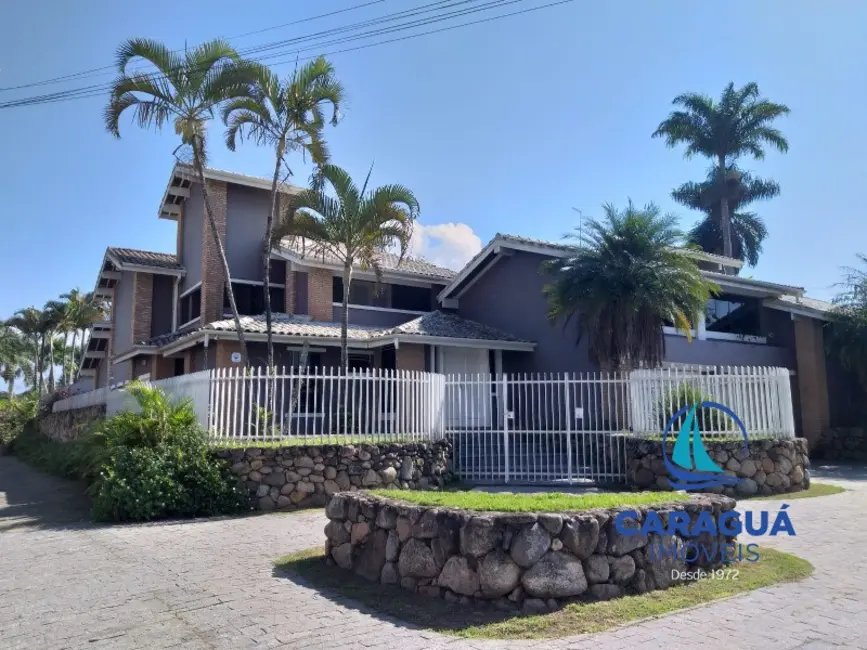 Foto 1 de Casa com 4 quartos à venda, 250m2 em Caraguatatuba - SP