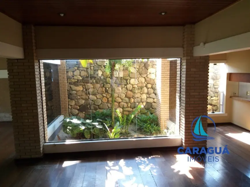 Foto 4 de Casa com 4 quartos à venda, 250m2 em Caraguatatuba - SP