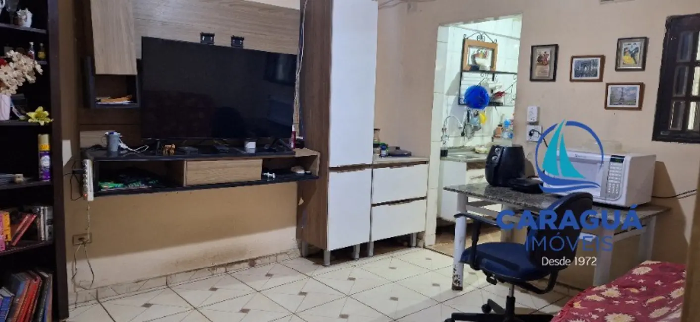 Foto 7 de Casa com 4 quartos à venda, 200m2 em Loteamento Jardim Aruan, Caraguatatuba - SP