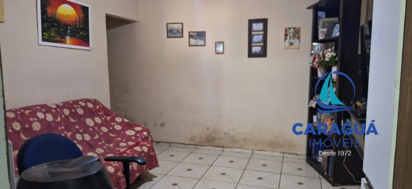 Foto 6 de Casa com 4 quartos à venda, 200m2 em Loteamento Jardim Aruan, Caraguatatuba - SP