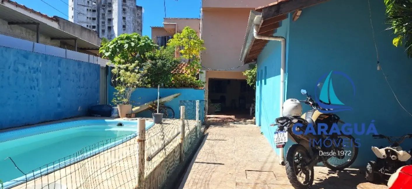 Foto 2 de Casa com 4 quartos à venda, 200m2 em Loteamento Jardim Aruan, Caraguatatuba - SP
