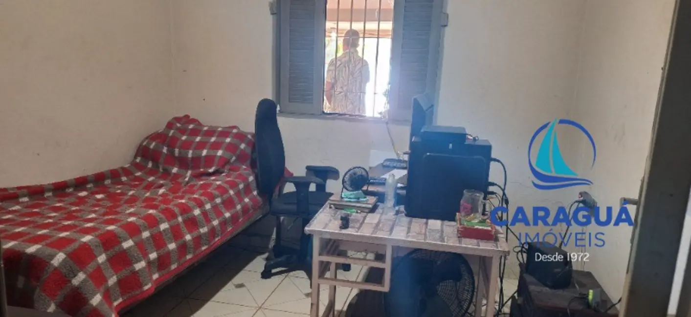 Foto 9 de Casa com 4 quartos à venda, 200m2 em Loteamento Jardim Aruan, Caraguatatuba - SP