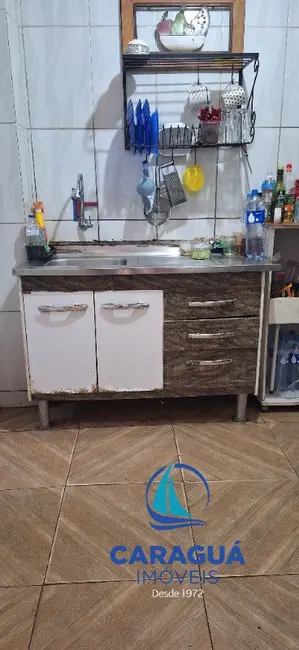 Foto 3 de Casa com 4 quartos à venda, 200m2 em Loteamento Jardim Aruan, Caraguatatuba - SP