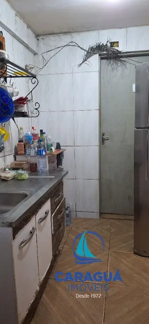 Foto 4 de Casa com 4 quartos à venda, 200m2 em Loteamento Jardim Aruan, Caraguatatuba - SP