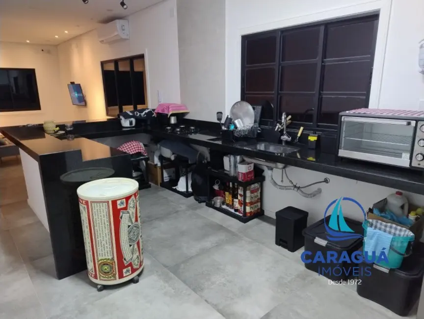 Casa de Condomínio com 2 quartos à venda, 100m2 em Caraguatatuba - SP - imagem 4 Foto 4 de Casa de Condomínio com 2 quartos à venda, 100m2 em Caraguatatuba - SP