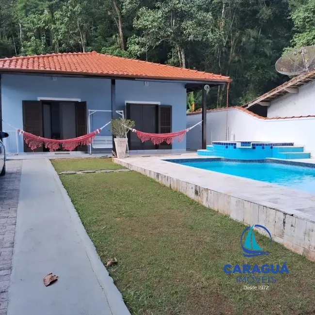 Foto 1 de Casa de Condomínio com 3 quartos à venda, 137m2 em Tabatinga, Caraguatatuba - SP