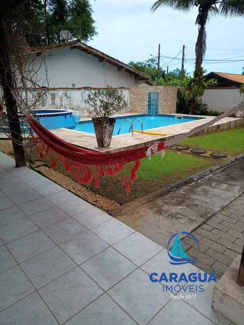 Foto 3 de Casa de Condomínio com 3 quartos à venda, 137m2 em Tabatinga, Caraguatatuba - SP