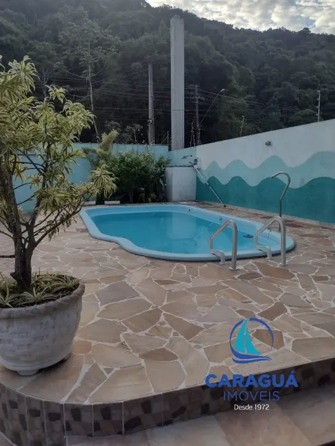 Foto 4 de Casa com 4 quartos à venda, 200m2 em Caraguatatuba - SP