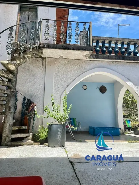 Foto 4 de Casa com 4 quartos à venda, 170m2 em Sumaré, Caraguatatuba - SP