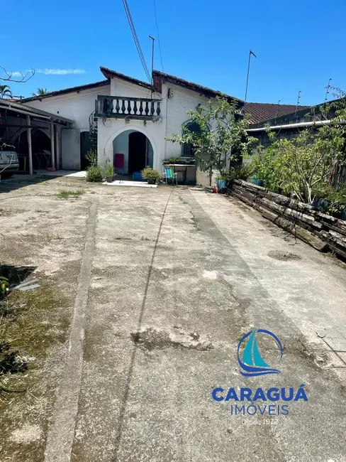 Foto 2 de Casa com 4 quartos à venda, 170m2 em Sumaré, Caraguatatuba - SP