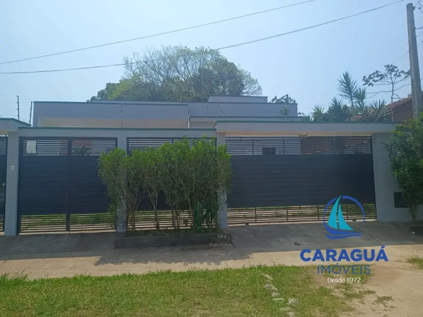 Foto 1 de Casa com 3 quartos à venda, 109m2 em Loteamento Morada do Mar, Caraguatatuba - SP