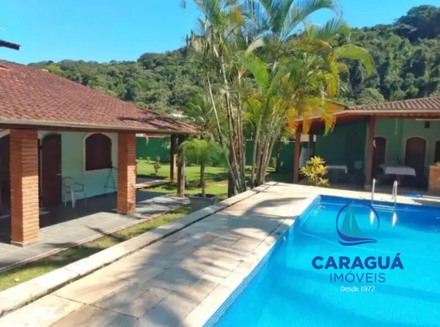 Casa com 4 quartos à venda, 300m2 em Caraguatatuba - SP - imagem 1 Foto 1 de Casa com 4 quartos à venda, 300m2 em Caraguatatuba - SP