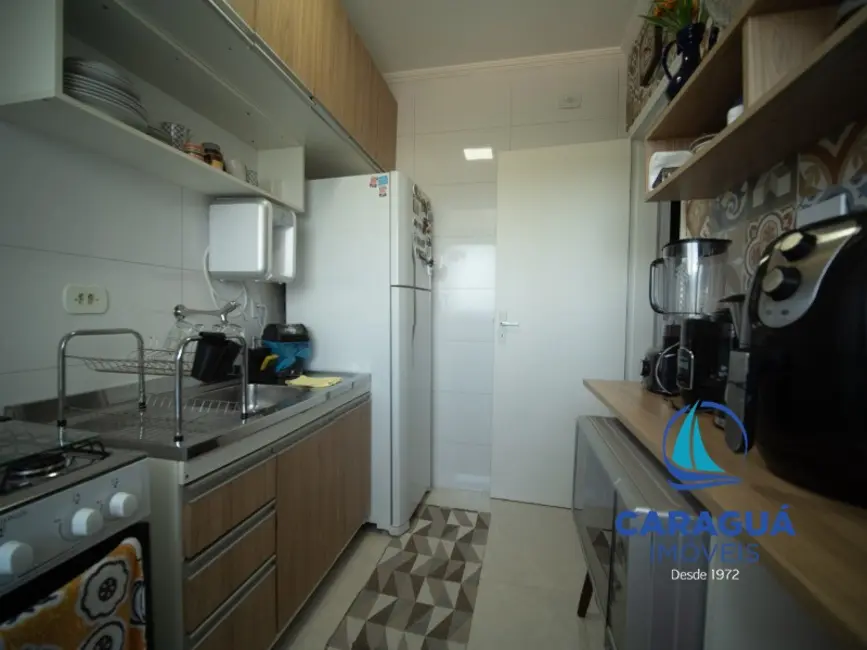 Apartamento com 2 quartos para alugar, 48m2 em Balneário Recanto do Sol, Caraguatatuba - SP - imagem 7 Foto 7 de Apartamento com 2 quartos para alugar, 48m2 em Balneário Recanto do Sol, Caraguatatuba - SP