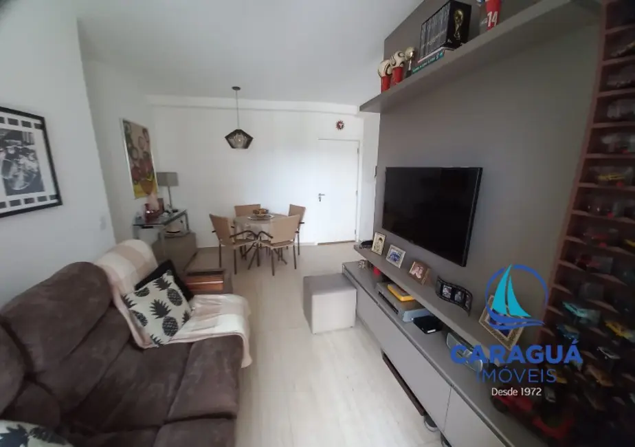 Foto 2 de Apartamento com 2 quartos à venda, 58m2 em Martim de Sá, Caraguatatuba - SP