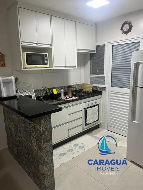 Foto 4 de Casa de Condomínio com 3 quartos à venda, 145m2 em Massaguaçu, Caraguatatuba - SP