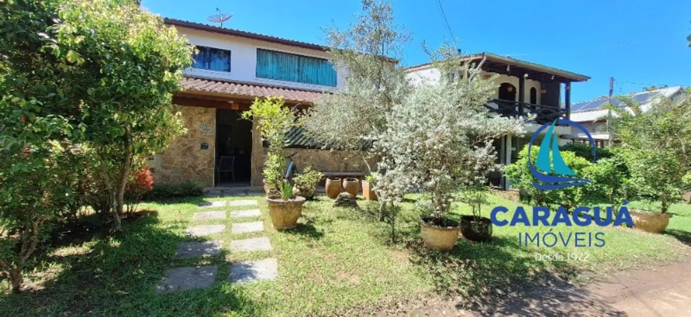Foto 4 de Casa com 4 quartos à venda, 221m2 em Caraguatatuba - SP