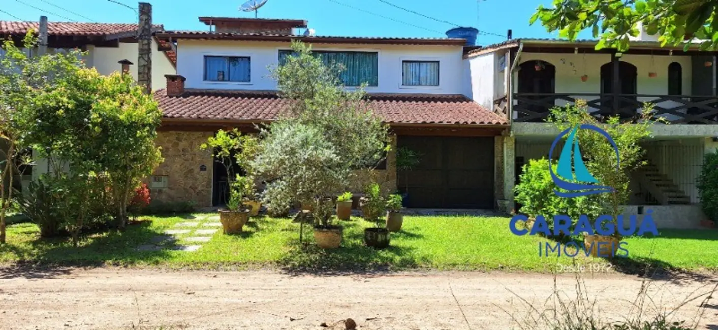 Foto 1 de Casa com 4 quartos à venda, 221m2 em Caraguatatuba - SP