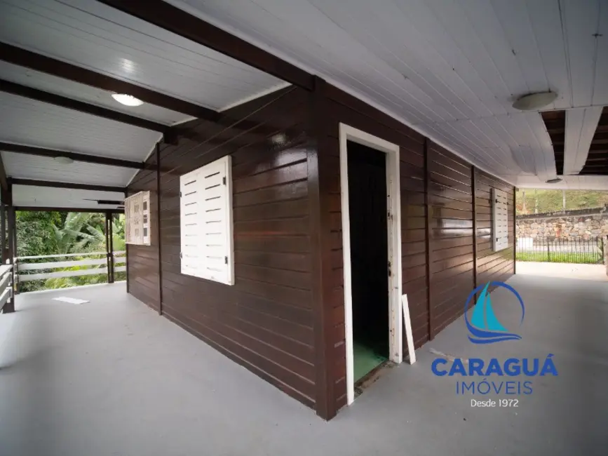 Foto 3 de Casa com 4 quartos para alugar, 200m2 em Martim de Sá, Caraguatatuba - SP