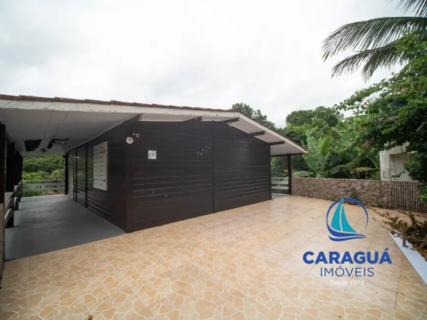 Foto 2 de Casa com 4 quartos para alugar, 200m2 em Martim de Sá, Caraguatatuba - SP