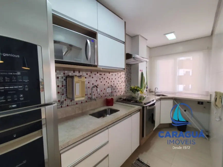 Foto 2 de Apartamento com 2 quartos à venda, 53m2 em Martim de Sá, Caraguatatuba - SP