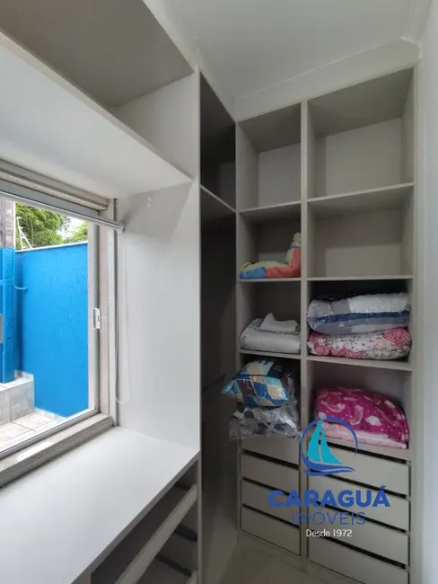 Foto 9 de Casa com 4 quartos à venda, 203m2 em Jardim Britânia, Caraguatatuba - SP