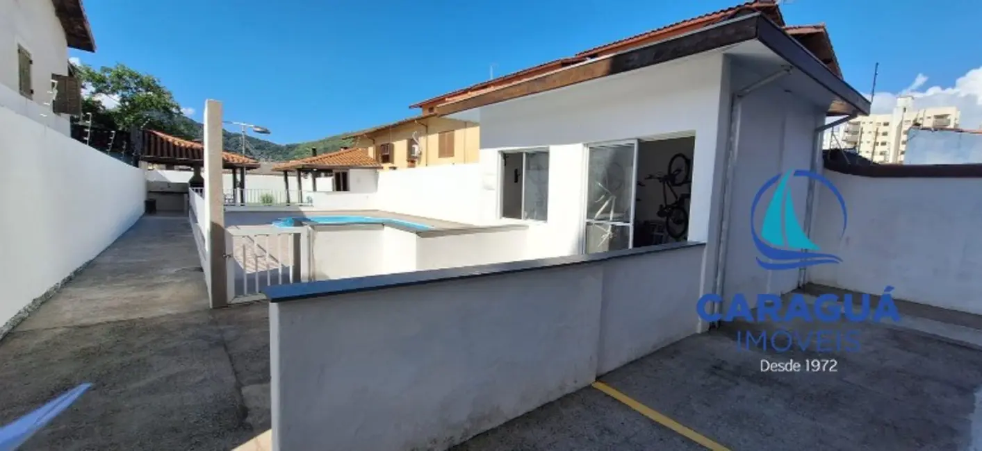 Foto 2 de Apartamento com 2 quartos à venda, 74m2 em Martim de Sá, Caraguatatuba - SP