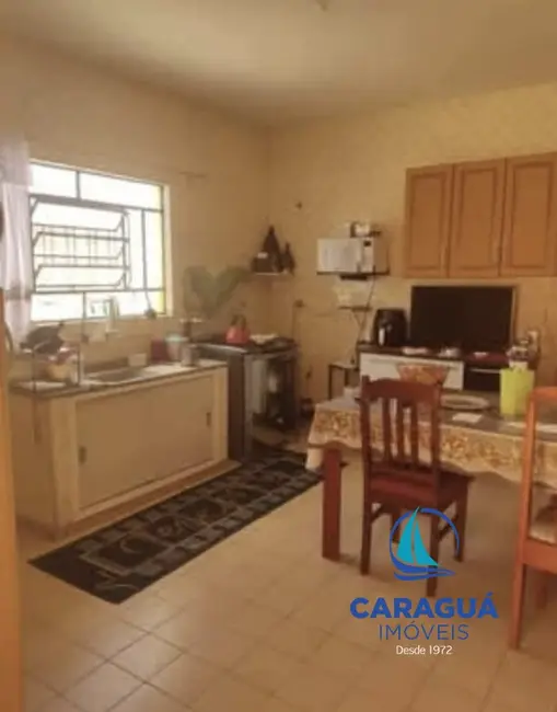 Foto 5 de Casa com 3 quartos à venda, 117m2 em Jardim Porto Novo, Caraguatatuba - SP
