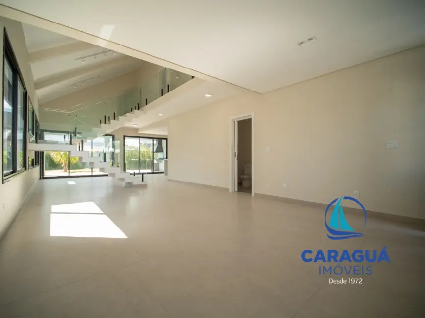 Foto 6 de Casa de Condomínio com 4 quartos à venda e para alugar, 288m2 em Massaguaçu, Caraguatatuba - SP