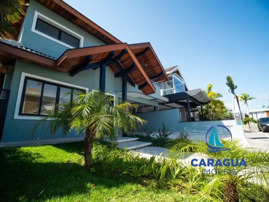 Foto 1 de Casa de Condomínio com 4 quartos à venda e para alugar, 288m2 em Massaguaçu, Caraguatatuba - SP