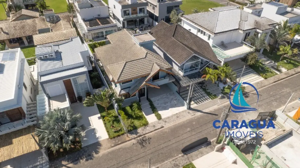 Foto 2 de Casa de Condomínio com 4 quartos à venda e para alugar, 288m2 em Massaguaçu, Caraguatatuba - SP