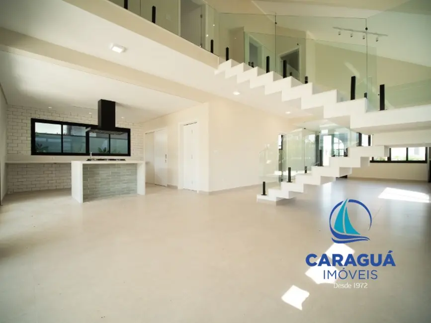 Foto 9 de Casa de Condomínio com 4 quartos à venda e para alugar, 288m2 em Massaguaçu, Caraguatatuba - SP
