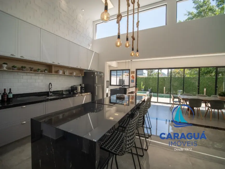 Foto 4 de Casa de Condomínio com 4 quartos à venda, 233m2 em Costa Nova, Caraguatatuba - SP