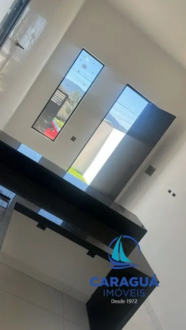 Foto 5 de Casa com 3 quartos à venda, 79m2 em Balneário Recanto do Sol, Caraguatatuba - SP