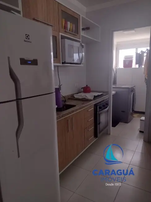 Foto 8 de Apartamento com 3 quartos à venda, 86m2 em Indaiá, Caraguatatuba - SP