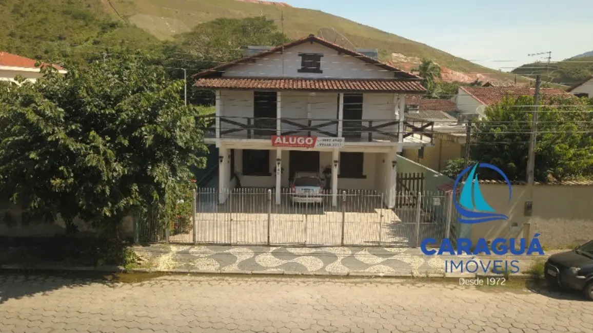 Foto 1 de Casa com 6 quartos à venda, 300m2 em Loteamento Balneário Camburi, Caraguatatuba - SP