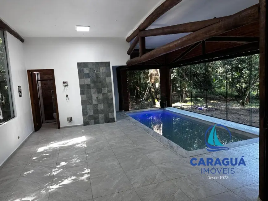 Foto 3 de Chácara com 4 quartos para alugar, 350m2 em Cantagalo, Caraguatatuba - SP