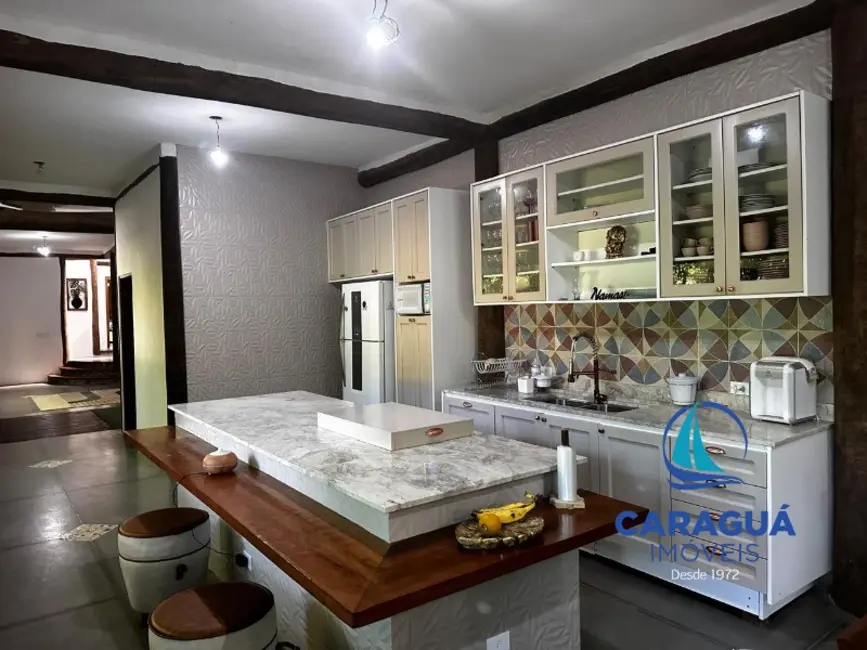 Foto 1 de Chácara com 4 quartos para alugar, 350m2 em Cantagalo, Caraguatatuba - SP