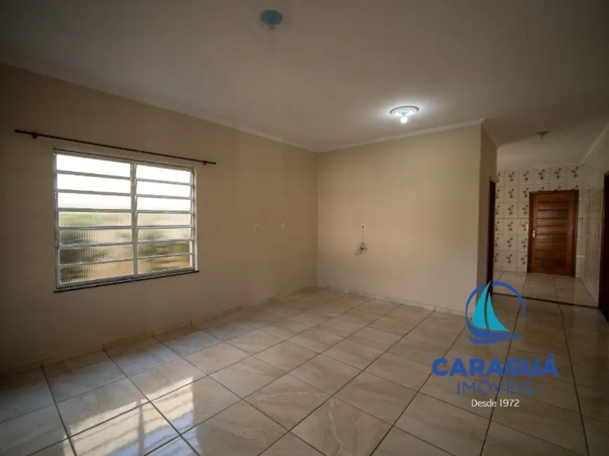 Foto 2 de Casa com 3 quartos para alugar, 130m2 em Martim de Sá, Caraguatatuba - SP