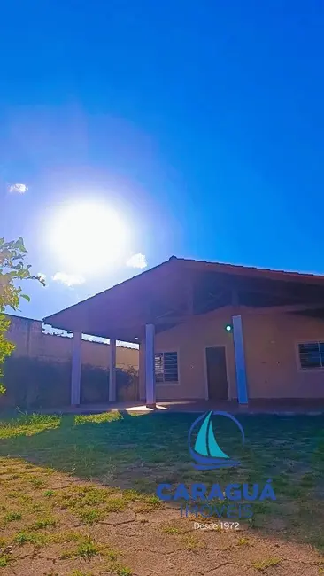 Foto 1 de Casa com 3 quartos para alugar, 130m2 em Martim de Sá, Caraguatatuba - SP